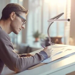 Daylight Company Techne Lamp D35000 13 Daylight Company Techne Lamp D35000 -ARTdiscount 35000 Techne AG 01 Architect working on a design scaled 1